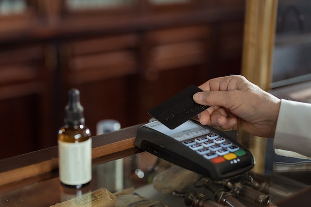 countertop card machine taking a payment